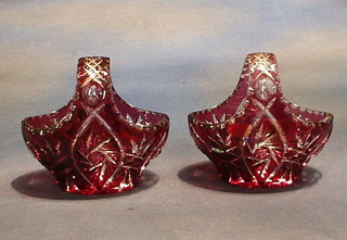 A pair of cut ruby glass boat shaped baskets 6"
