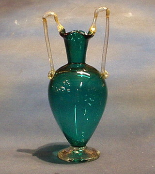 A green glass twin handled vase 10"