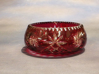 A circular ruby cut glass fruit bowl 8"