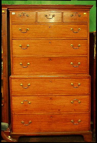 A Georgian mahogany chest on chest with moulded cornice, the upper section fitted 3 short drawers above 3 long drawers, the base fitted 3 long drawers raised on bracket feet 44"