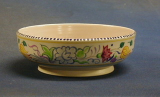A 1960's Poole circular pedestal dish with floral decoration, the base with dolphin mark and impressed 344 6"