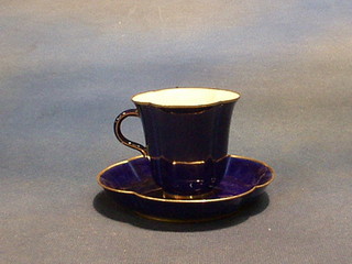 A Sevres porcelain blue ground and gilt banded cabinet cup and saucer, marked Dore A Sevres '86