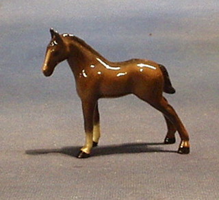 A Royal Doulton figure of a standing bay foal 4"