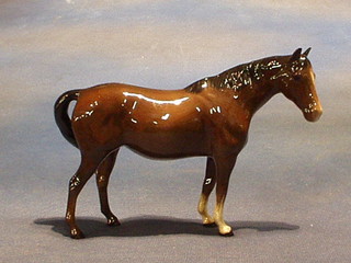 A Beswick figure of a standing bay horse 5"