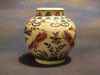 A 19th Century Japanese Imari porcelain ginger jar decorated bids amidst flowering branches 7"