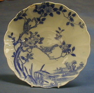 A 19th Century Oriental blue and white porcelain dish, decorated birds in flowering branches 11" chipped