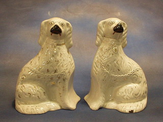 A pair of 19th Century Staffordshire figures of seated Spaniels 13" (f and r)