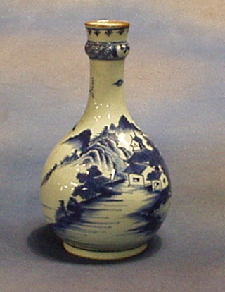 An 18th/19th Century Oriental blue and white porcelain bottle vase 10"