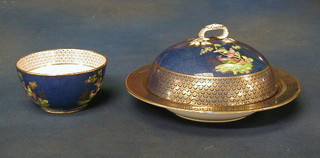 A 17 piece Spode porcelain tea service decorated birds amidst flowering branches, with gilt banding against a deep blue ground - 2 large plates, muffin dish and cover, 7 tea plates, sugar bowl and 6 saucers