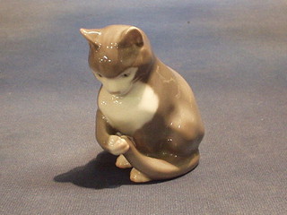 A Royal Copenhagen figure of a seated cat, the base marked B&G 1553 NE 4"