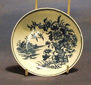 An  Dr Wall period Worcester porcelain blue and white saucer with landscape decoration 4" (firing burnish to side)