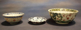 A 19th Century Japanese Canton famille vert porcelain bowl with lobed decoration 7", a modern rice bowl and an 18th Century blue and white saucer 4"