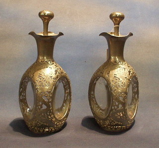 2 glass Dimple Haig bottles with Indian pierced pewter decoration