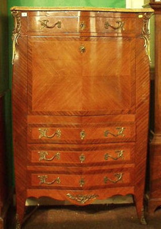 A 19th/20th Century French Kingwood serpentine fronted escritoire with pink veined marble top, the fall front revealing a well fitted interior above 3 long drawers 38"