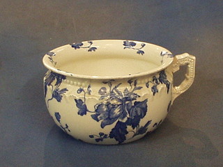 A blue and white glazed pottery chamber pot and an oval pottery meat plate