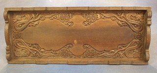 A carved Oriental twin handled bottle tray 22"