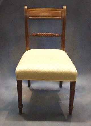 A set of 3 Georgian inlaid mahogany bar back dining chairs with rope stretchers, on turned supports