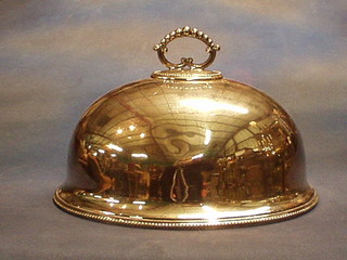 An oval silver plated meat cover