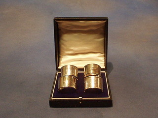A set of 6 plain silver napkin rings
