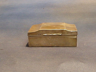An Art Deco silver cigarette box with hinged lid and engine turned decoration, Birmingham 1929