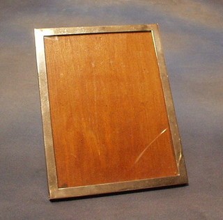 A rectangular plain silver easel photograph frame Birmingham 1929 9" x 7"