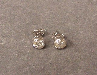A pair of single stone old cut diamond ear studs (approx 2.02 ct)