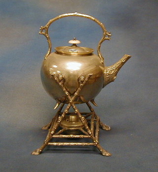 A silver plated spirit kettle on crab stock supports