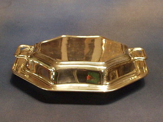 An octagonal silver plated entree dish and cover