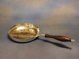 A silver plated chafing dish with turned wooden handle