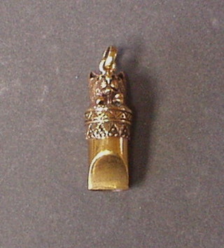 A gilt metal whistle in the form of a cat