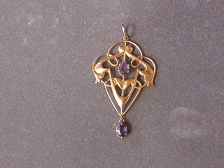 An Edwardian 9ct gold pendant set amethysts