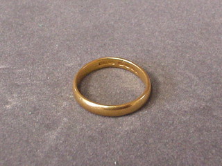 A high carat gold wedding band