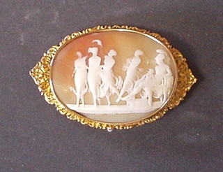 A lady's Victorian shell carved cameo brooch contained in a gilt metal mount