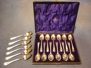 A set of 12 silver plated teaspoons, cased and 6 silver plated teaspoons decorated 1930's actors