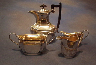 A silver plated hotwater jug with ebony handle and 8 other items other items