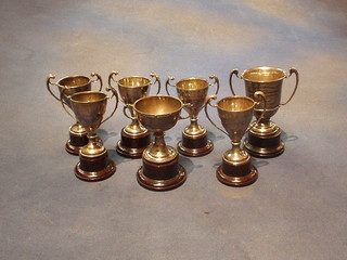 7 silver trophy cups, 16 ozs