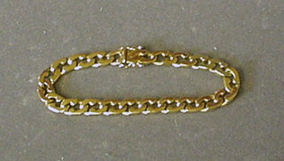 A modern 9ct gold curb link bracelet