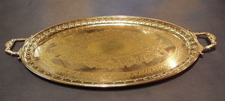 A circular silver plated  twin handled tea tray 29"