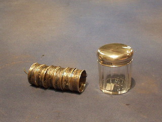 A cut glass dressing table jar with silver lid engraved B and 5 niello napkin rings