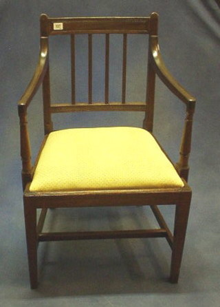 A set of 7 19th Century mahogany stick and rail back dining chairs (1 carver, 6 standard)