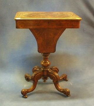 A Victorian inlaid figured walnutwood rectangular work table, raised on bulbous turned and tripod supports 21"