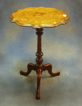 A Victorian shaped inlaid walnutwood wine table, the top inlaid flowers and raised on spiral turned and column supports 20"