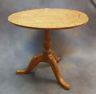 An  18th Century elm circular snap top tea table 30"