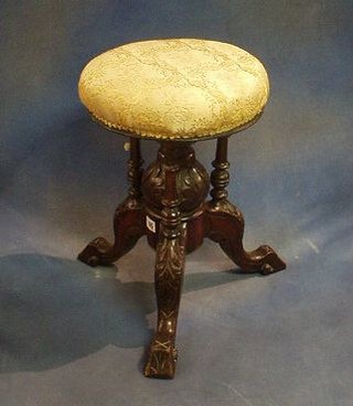 A Victorian mahogany adjustable piano stool