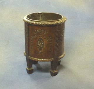 A 19th Century Chippendale style circular carved mahogany planter with copper line raised on square tapering supports 8"