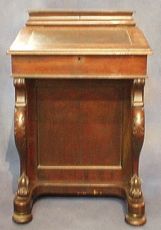 A Victorian rosewood Davenport desk with hinged stationery box, the pedestal fitted 4 drawers and raised on cabriole supports 23"