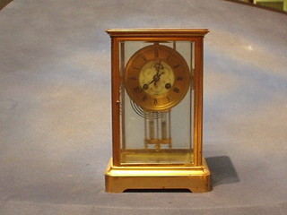 A 19th Century French striking 4 glass clock with twin mercury pendulum having gilt chapter ring and Roman numerals by E Flory of Nimes