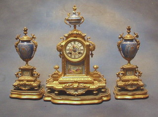 A 19th Century  gilt painted spelter and "Sevres" porcelain 3 piece clock garniture, the French 8 day striking mantel clock with Roman numerals and porcelain dial together with 2 urns and covers