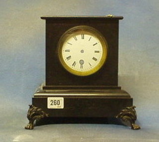 A Victorian 8 day striking mantel clock contained in a black slate case (f)