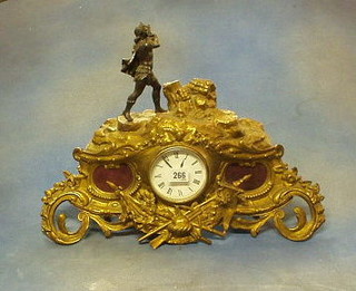 A French 19th Century gilt spelter clock case surmounted by a bronze figure of a gentleman playing a harp